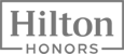 This image shows the Hilton Honors logo, featuring the text "Hilton" in a rectangle above the word "Honors".